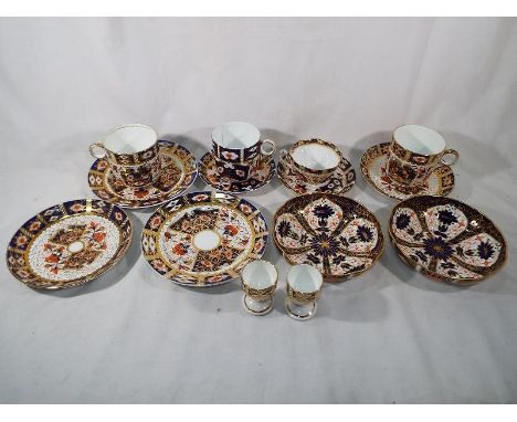 A collection of ceramic table ware by Royal Crown Derby and similar. (14)