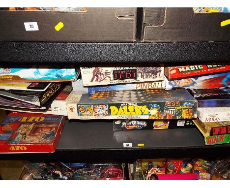 A full shelf containing a large quantity of board games