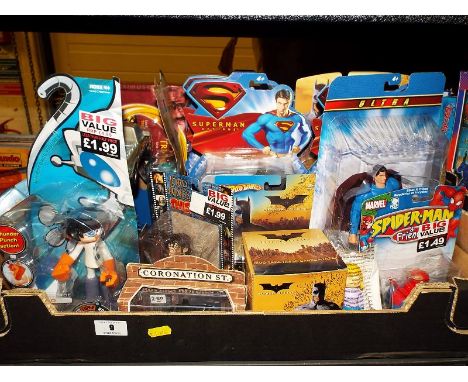 A collection of predominantly sealed blister packs to include Superman, Spiderman, Lord of the Rings, Batman and similar