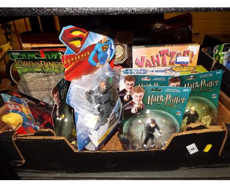 A collection of predominantly sealed blister packs to include Superman, Harry Potter, Lord of the Rings, Power Rangers, Pez a