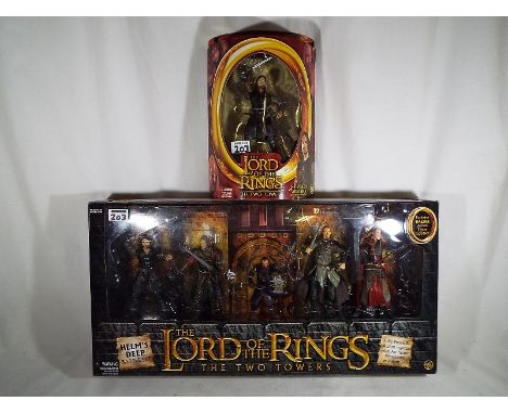 Lord of the Rings - 2 mint in box Lord of the Ring figure sets to include Lord of the Rings The Two Towers Helm's Deep battle