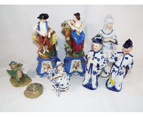 A small collection of early 20th century European figural ceramic ornaments
