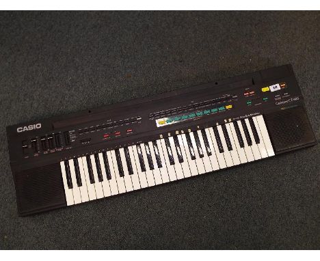 A Casio Tone CT - 460 keyboard