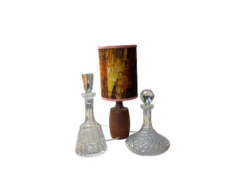 Wooden table lamp with shade together with two glass decanters, lamp H43cm