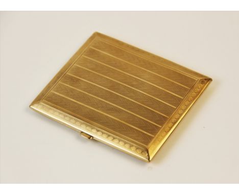 An Art Deco 9ct gold cigarette case, of rectangular form with engine turned decoration to exterior and round vacant cartouche
