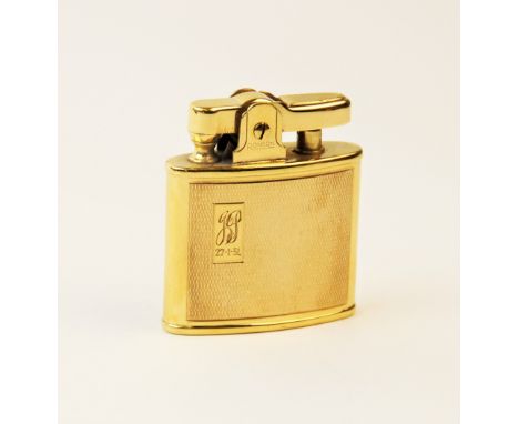 A gold plated Ronson lighter, of rectangular form with engine turned decoration with cartouche engraved 'JP 27-1-51' 4.8cm hi