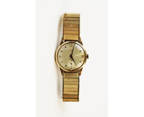 A 9ct gold vintage Roamer Incabloc wristwatch, the round cream dial with baton and Arabic numeral markers, subsidiary seconds