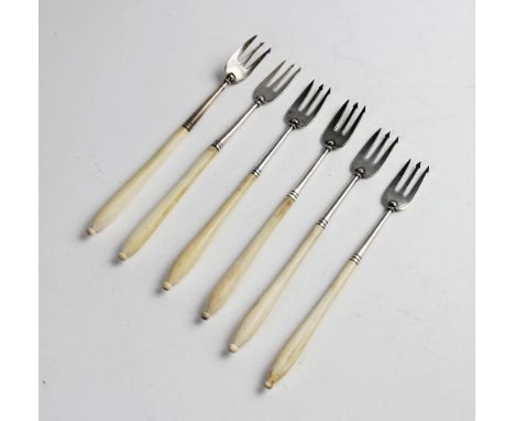 Six silver ivory handled pickle forks, four by Chawner & Co, London 1857, two by Elkington & Co, Sheffield 1883, each 16.5cm 