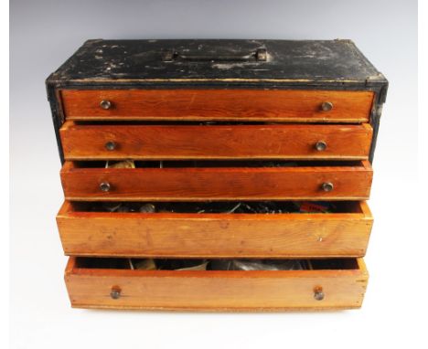 A collection of watch parts and effects, to a painted wooden five drawer specimen chest, to include watch cases, lenses, spri