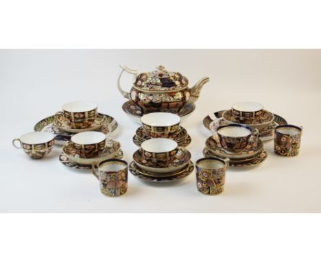 A collection of Derby imari decorated tea wares, comprising: an early 19th century part tea service to include a teapot, cove