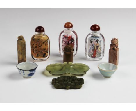 A selection of Chinese objects of virtue, 19th century and later, comprising; three reverse painted snuff bottles, each 9.5cm