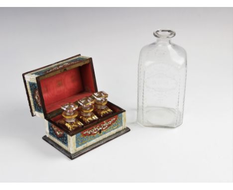 A French perfume caddy, late 19th century, the brass inlaid caddy decorated in a faux champlevé enamel pattern, the hinged co