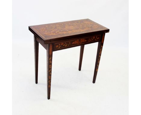 A 19th century Dutch marquetry mahogany card table, the rectangular top inlaid with swept foliate detail and birds, opening t