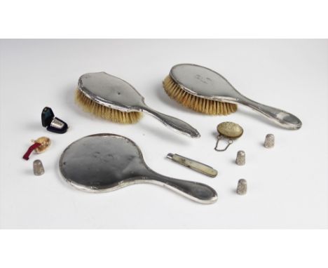 A selection of lady's dressing tableware and accessories, to include a matched silver backed hairbrush and mirror, each engra
