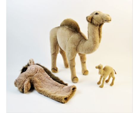 A vintage Steiff plush toy camel, circa 1950s, paper label to neck, 15cm high, with a large Steiff plush toy camel, yellow ta
