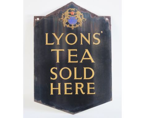 An enamel advertising sign "Lyons' Tea Sold Here" gilt lettering to a black ground, 61 x 42cm. 