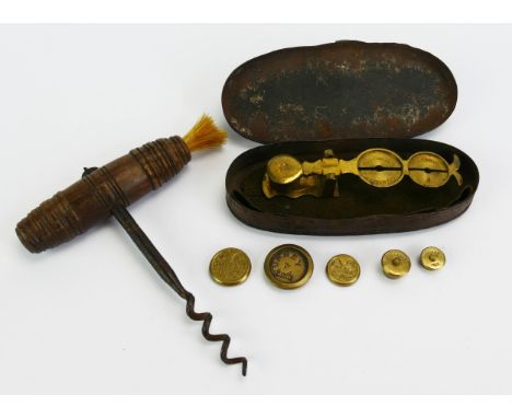 A 19th century brass sovereign scales, and weights contained in a jappaned tin together with a pull-through corkscrew, with r