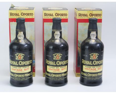 Three bottles Vintage Royal Oporto, 1977 port, all in pictorial boxes. 