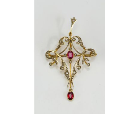 A 9ct Gold, Ruby and Seed Pearl Pendant with detachable suspension and brooch back, 58.4mm drop, stamped 9CT, 4.2g 