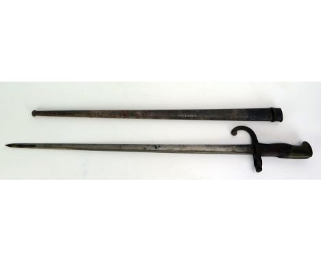 A late 19th century French Gras bayonet, with 52cm T-shaped blade dated 1880,  wood grips contained in a steel scabbard.  WE 