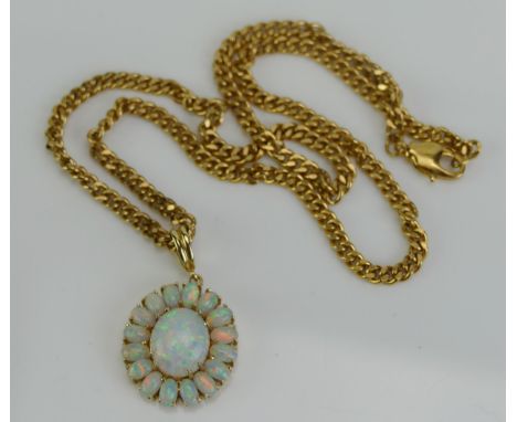 An Opal Pendant in a yellow metal setting, 33.6mm drop, stamped 4Kt, KEE tests as 14K, 6.7g and on a gold plated chain.  UNLE