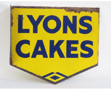 An enamel double-sided advertising sign, "Lyons Cake", blue lettering to a yellow ground, 40 x 45cm. 