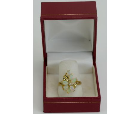 A 14K Gold, Opal and Diamond Ring, size P, stamped 585 14K, 2.39g 