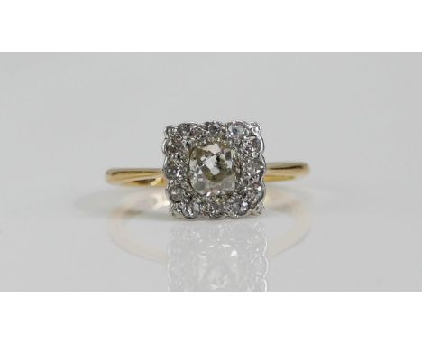 An Antique 18ct Gold and Diamond Square Cluster Ring, platinum set c. 5mm principal old cut, 10x9.5mm head, size M.5, stamped