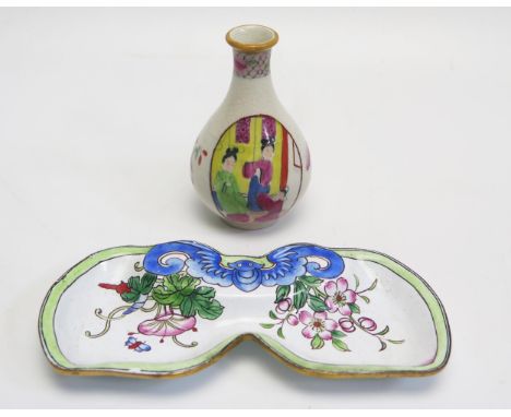 A Chinese enamel dish of kidney-shaped outline, with bat and floral decoration 14cm wide, together with a small famille rose 