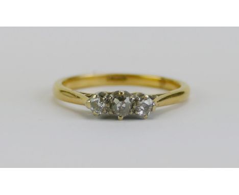 An 18ct Gold and Old Cut Diamond Three Stone Ring, c.3.3mm principal stone, size P, 3.11g 