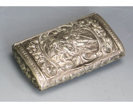 A continental silver snuff box, stamped marks, of rectangular outline, the hinged lid decorated with lovers in a wooded bower