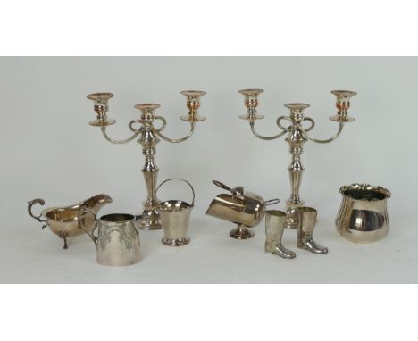 A collection of plated wares including as pair of twin branch candelabra, sauce boat, cream jug, helmet sugar basin, vase, bo