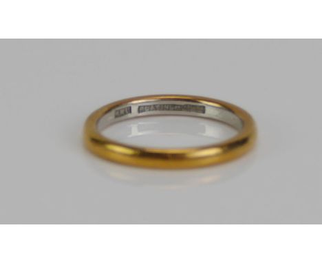 A 22ct Gold and Platinum Wedding Band, inner band platinum, size K.25, 3.29g 