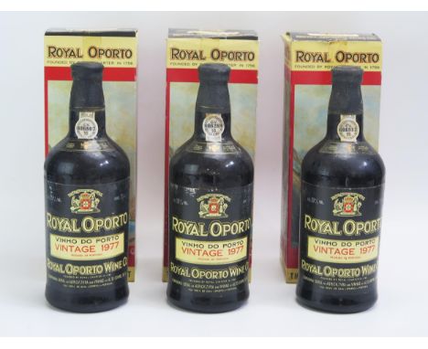 Three bottles Vintage Royal Oporto, 1977 port, all in pictorial boxes. 