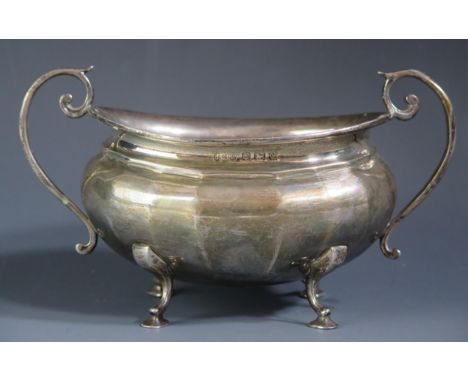 A George V silver twin handled sugar basin, maker Joseph Gloster Ltd, Birmingham, 1923, of lobed oval outline raised on four 