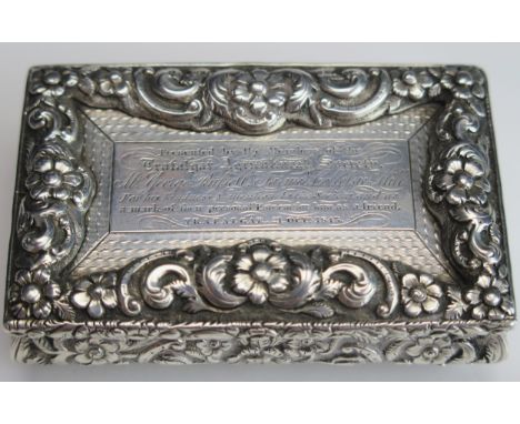 A Victorian silver table top snuff box, maker Joseph Willmore, Birmingham, 1845, presentation inscription, with moulded flora