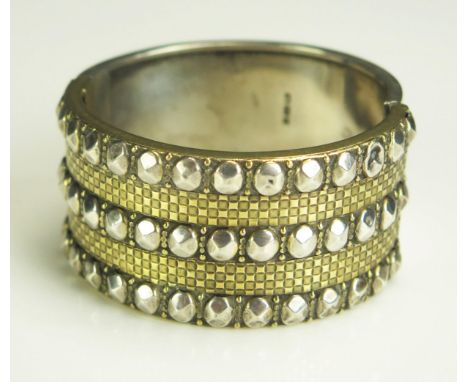 A Victorian Silver and Gilt Decorative Hinged Bangle, Birmingham 1882, 48.58g 
