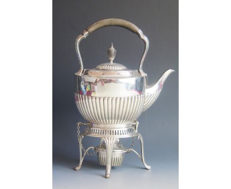 An Edward VII silver tea kettle, stand and burner, maker William Hutton &amp; Sons Ltd, Sheffield, 1905, of oval form with ha