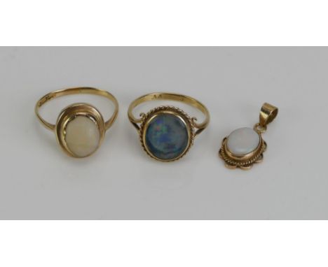 A 9ct Gold and Opal Doublet Ring (size M.5, rubbed marks, 2.13g), another 9ct gold and opal ring (size M.5, hallmarked, 1.91g