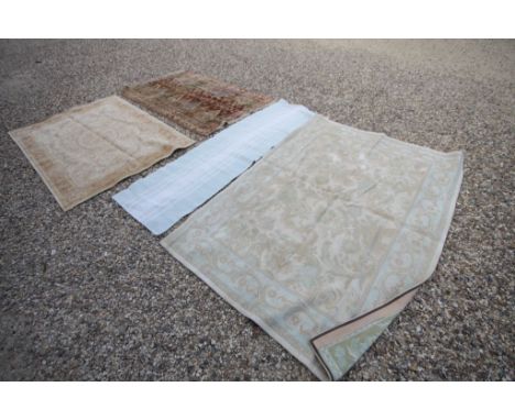 Eastern Wool Rug with Geometric Patterns together with Four Further Rugs and a Rug Cushion