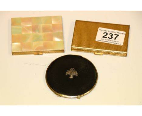 Bakelite & chrome compact, marcasite set basket of flowers decoration & mother of pearl checkerboard compact & another compac