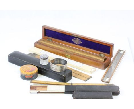 Draughtsman drawing tools to include a cased set of six vintage wooden rulers in Robson of Newcastle on Tyne box, two slide r