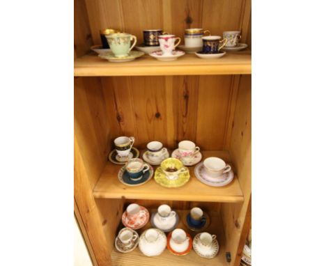 Twenty Cabinet Cups and Saucers including Royal Crown Derby, Doulton, Russian Hand Decorated, Royal Worcester, Wedgwood, Limo