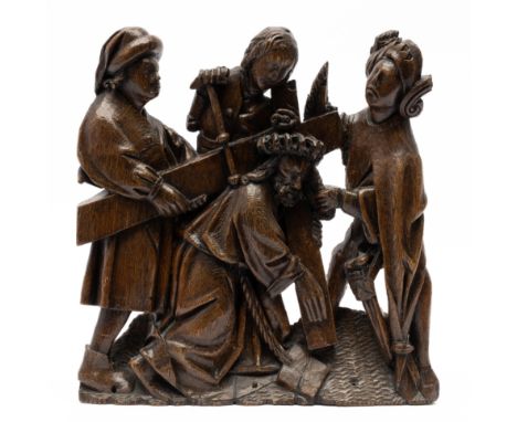 A Southern Netherlands carved oak group of Christ carrying the Cross, Early 16th century, Brabant, 34x33x5 cm, Showing Christ