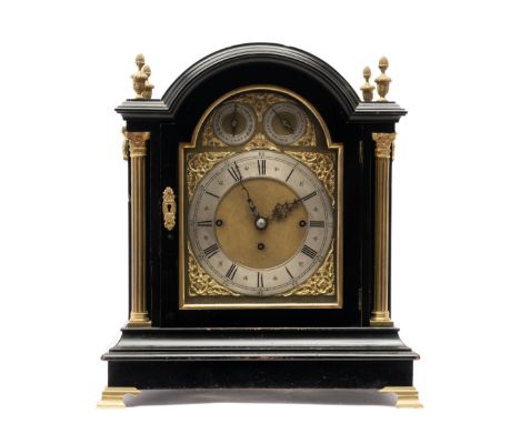 An Edwardian brass-mounted ebonised bracket clock, Early 20th century, 46,5x42x25,5 cm, The case surmounted by four vase fini