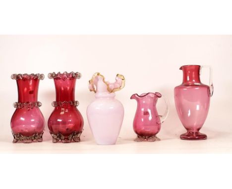 Five Victorian and Later Glass Vases and Jug to include one Pink Vaseline Glass Vase and Four Cranberry Glass Frilled items. 