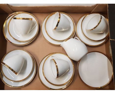 Czechoslovakian gold on white tea ware items to include milk jug, 6 side plates, 5 saucers and 5 tea cups. 