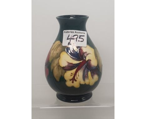 Moorcroft Hibiscus pattern vase on green/blue graduated ground 13.5cm in height.