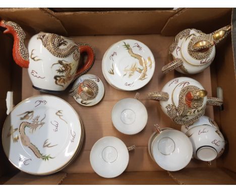 Kanesho dragon theme tea set consisting of teapot, lidded sugar bowl, lidded milk jug, 6 side plates, 5 saucers and 6 tea cup