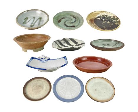 Studio pottery plates and chargers By a range of studio potters, including Saltings Pottery (Sally HUDSON (1926-2009)) and tw